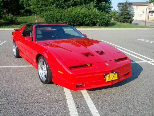 Bright red 1989 trans am gta with grey leather interior