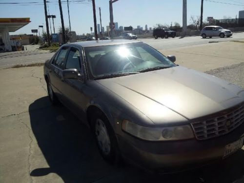Grey sedan, one owner ( clean title)  , fine condtion , all electrical