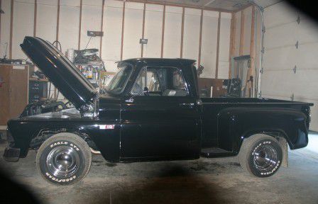 1965 chevy stepside shortbox black pickup truck - frame off restoration