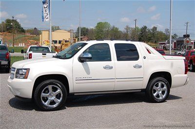 Save at empire chevy on this loaded ltz with gps, sunroof, dvd and power steps