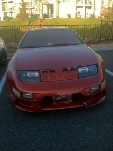 Orange 300zx na automatic 4 seater, with body kit and a greedy exhaust