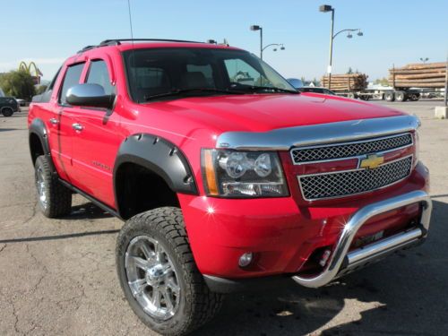 Red 2007 avalanche lifted 4x4