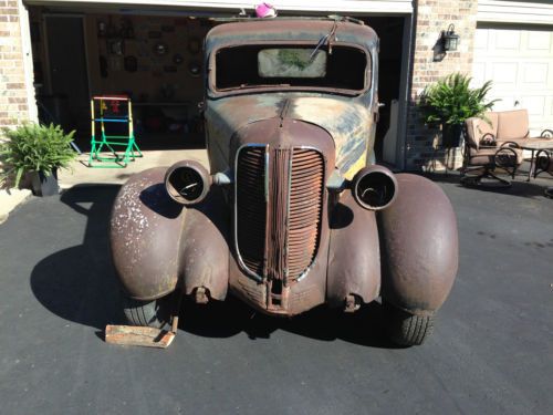 1937 dodge pick-up, solid old truck, no bed.