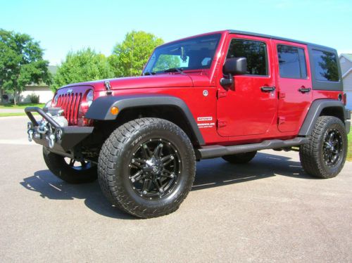 Jeep wrangler unlimited, lifted, 35 inch tires, winch, bumper, clean