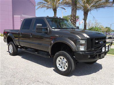 Lifted diesel 4x4 lariat leather crew short moon strobes sweet truck fl