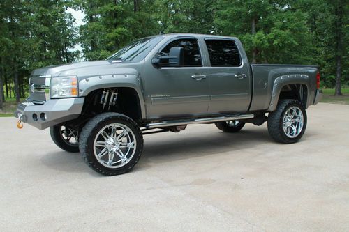 Fully loaded,8in cognito lift,24in fuel hostage wheels,4in magnaflow exhaust,etc