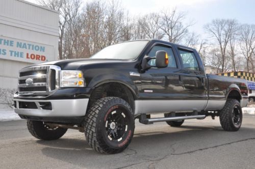 1 of a kind ! 4x4 - crew cab - lifted - powerstroke turbo diesel - no reserve