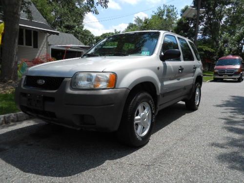2002 ford escape 4x2 v-6 183,000 miles, 6 cd changer, low reserve ,**** look****