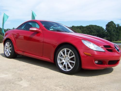 Hard top convertible;116k miles; traffic stopping red;leather;2 keys;no reserve!