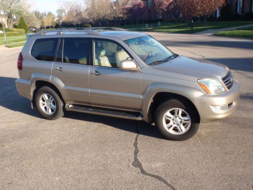 Fine gold 2003 gx470 always maintained no major damage history - great car!!!!!