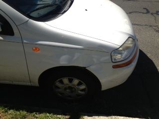 2004 white chevy aveo with only 60,000 milies, good condition but needs work