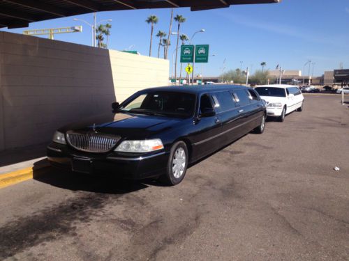 Black executive lincoln town car limousine-the only one with five door in town