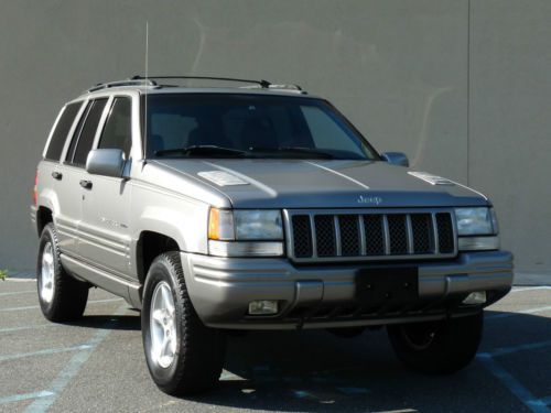 ~~98~jeep~grand~cherokee~limited~5.9l~v8~leather~sunroof~rare~no~reserve~~