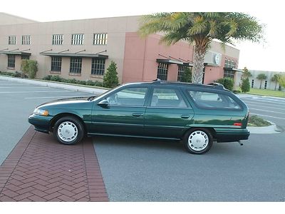 Fl one owner low low miles wagon like taurus cold ac rare find 3rd row nice