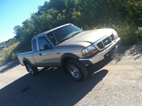 2000 ford ranger 4x4 ext.cab 84k only runs like a top . no reserve !!
