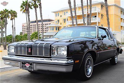78 cutlass supreme with 4702 miles from new!  black/black, spectacular example