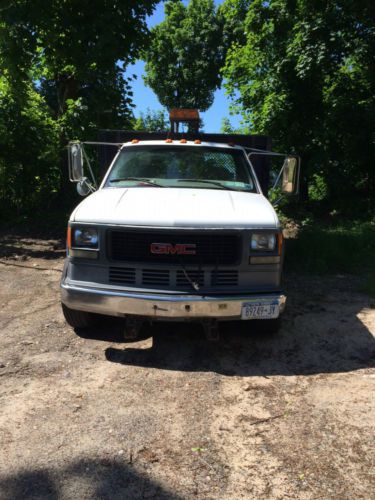 Used gmc 2000 stake body truck with 7 1/2 ft plow
