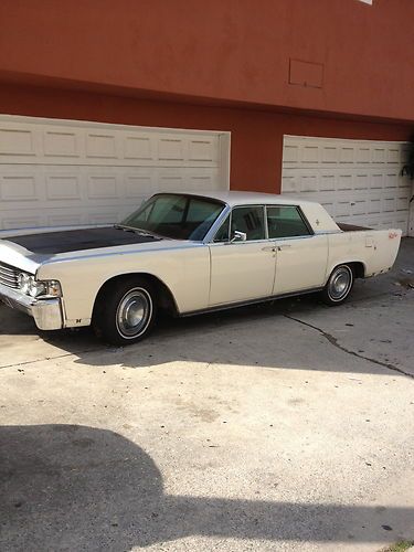 Lincoln continental 1965 suicide doors