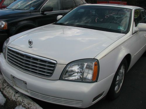 2004 cadillac de ville, pearl white,83,000 miles priced to sell at $6495