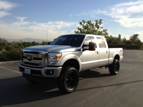 2011 ford super duty f250 4x4 crew cab (6.2l gas) lariat lifted short bed