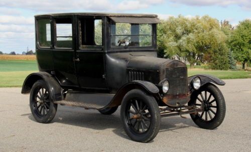 1927 model t ford four door, straight steel body, many new parts. hard work done