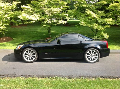 2006 cadillac xlr v convertible 2-door 4.4l with only 11,957 original miles
