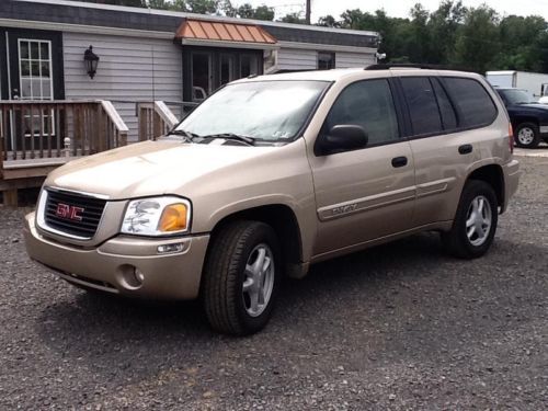 2004 gmc envoy 4wd suv with 6 month drive-train warranty
