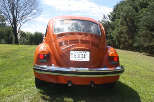 Orange 1974 volkswagon superbeetle