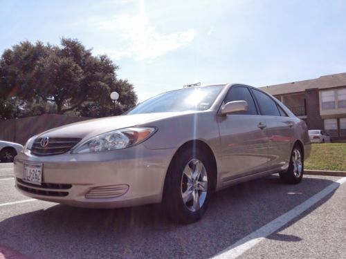 2002 golden toyota camry v6 xle w/ 109,000 miles &amp; clean title &amp; chrome wheels