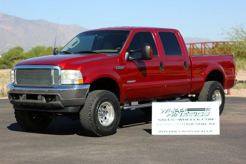 2003 ford f250 diesel lariat crew cab 4x4 4wd leather lifted runs great see vid