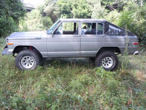 1989 jeep 4x4, converted to 4 dr truck, partial soft top, 33inch wheels