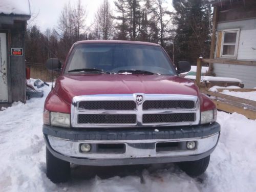 1999 red dodge ram 1500, v8, 4wd, 6 1/2 ft bed, xtra parts, towing/brake package