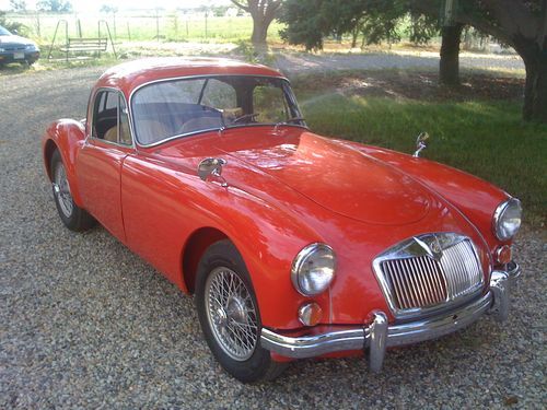 1957 mga coupe 2-door red
