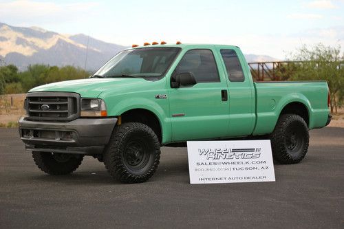 2004 ford f250 diesel manual 6 speed 4x4 4wd 4 door in mint condition!  see vide