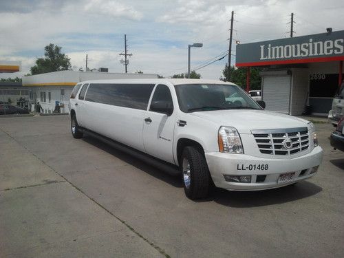 Chev. tahoe with an escalde kit. 18 passenger. white limousine