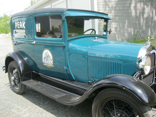 1929 model-a ford deluxe delivery sedan. very rare car. restored 1999