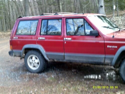 1989 cherokee jeep larto red  excellent running jeep~take anywear