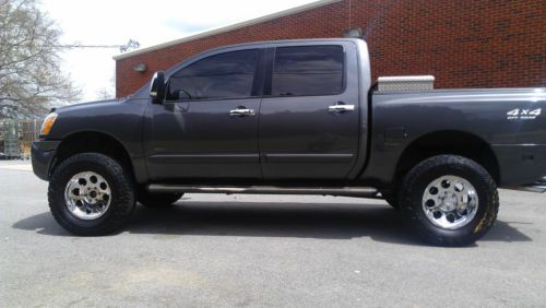 Smoke/pewter gray lifted, loaded, leather, 4 door, 18&#034; procomp rims, 35&#034; nittos