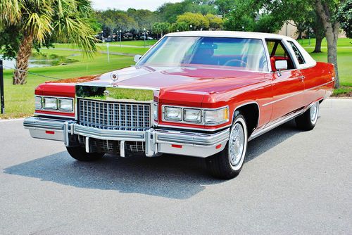 Absolutly incredable just 3393 hundred miles 1976 cadillac deville red /white.