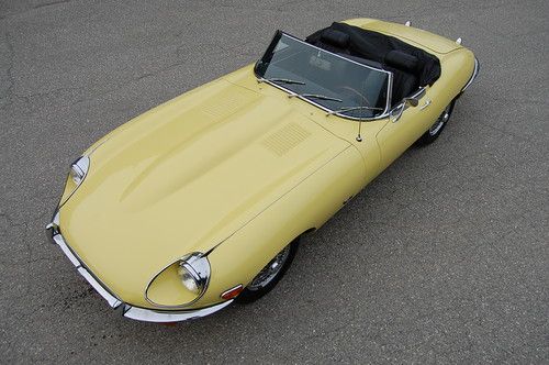 1971 jaguar xke series 2 roadster. yellow with black interior.