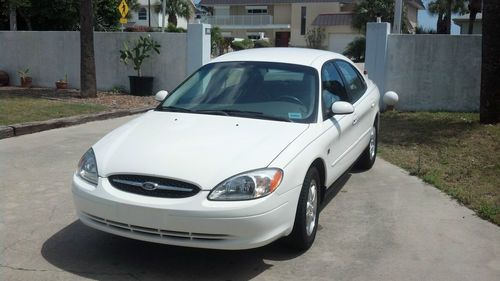 2002 ford taurus sel 23k miles. super clean, low mileage car. loaded, 24v