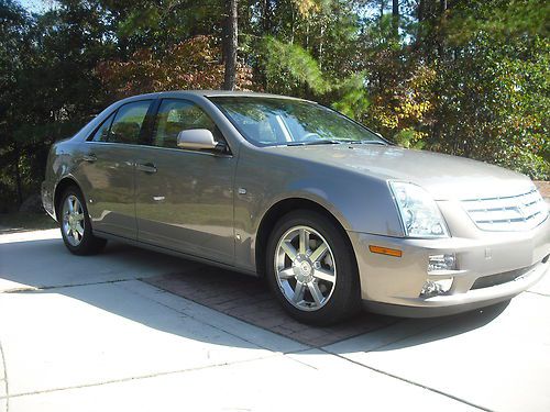 2007 cadillac sts in exellent condition, new tires, raleigh, trade for suv,truck