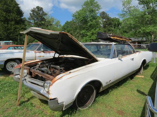 1966 oldsmobile delta 88 convertible roof  plus extra parts car