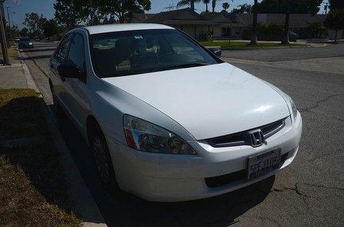 2005 honda accord dx, white, 65000 miles, clean title, good condition