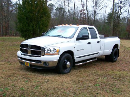 White dodge 5.9 turbo diesel dually with 6peed standard transmission