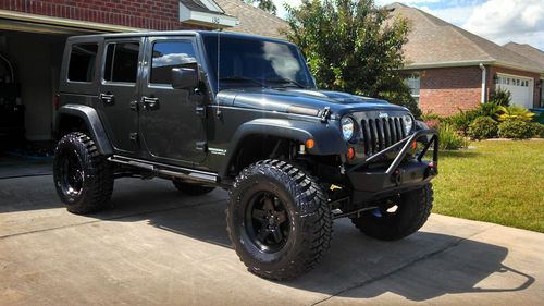 Lifted 2010 jeep wrangler rubicon unlimited jk dark slate grey great condition