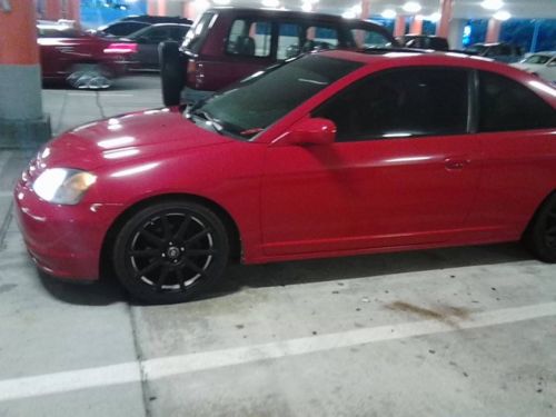 Selling my 2001 honda civic 2 drs sunroof, sound system, rims car is red, cyl 4