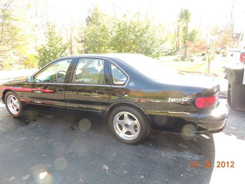 Immaculate 1996 black impala ss loaded with 6,098 miles yes 6,098!!!