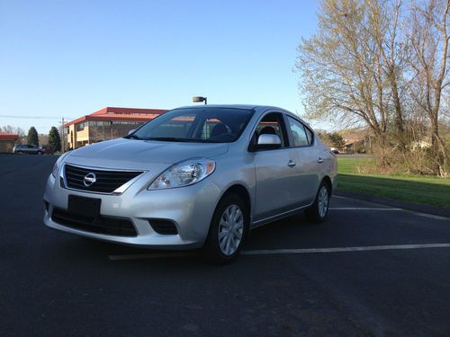 2012 nissan versa sv.... great on gas....low miles
