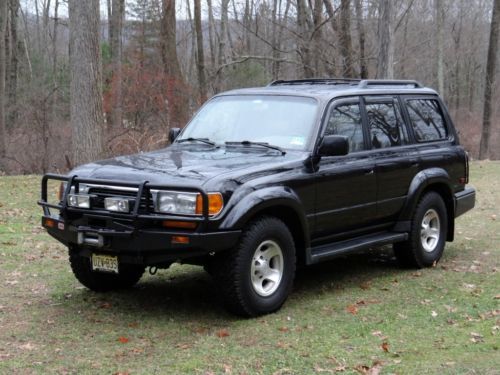 The last year of the 80 series in black wrapped with front and back arb bumpers